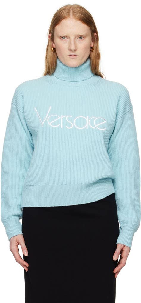 Versace: Blue Embroidered Turtleneck 